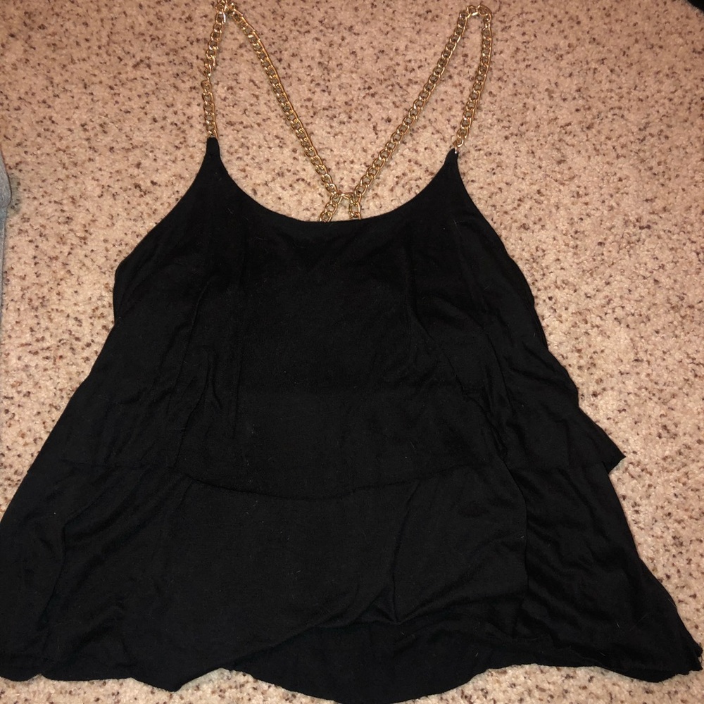 Black shirt with gold chain straps